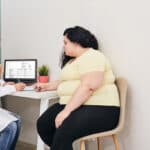 A patient speaking with their doctor